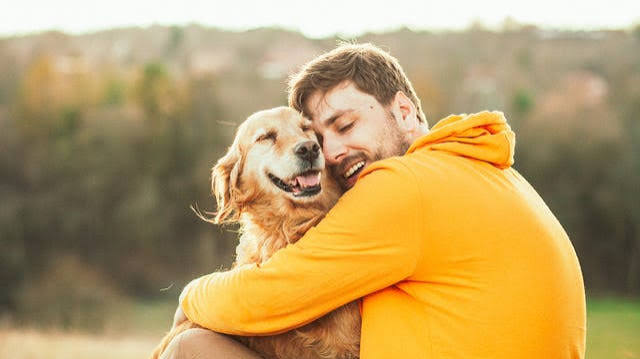 Hond met zijn baasje